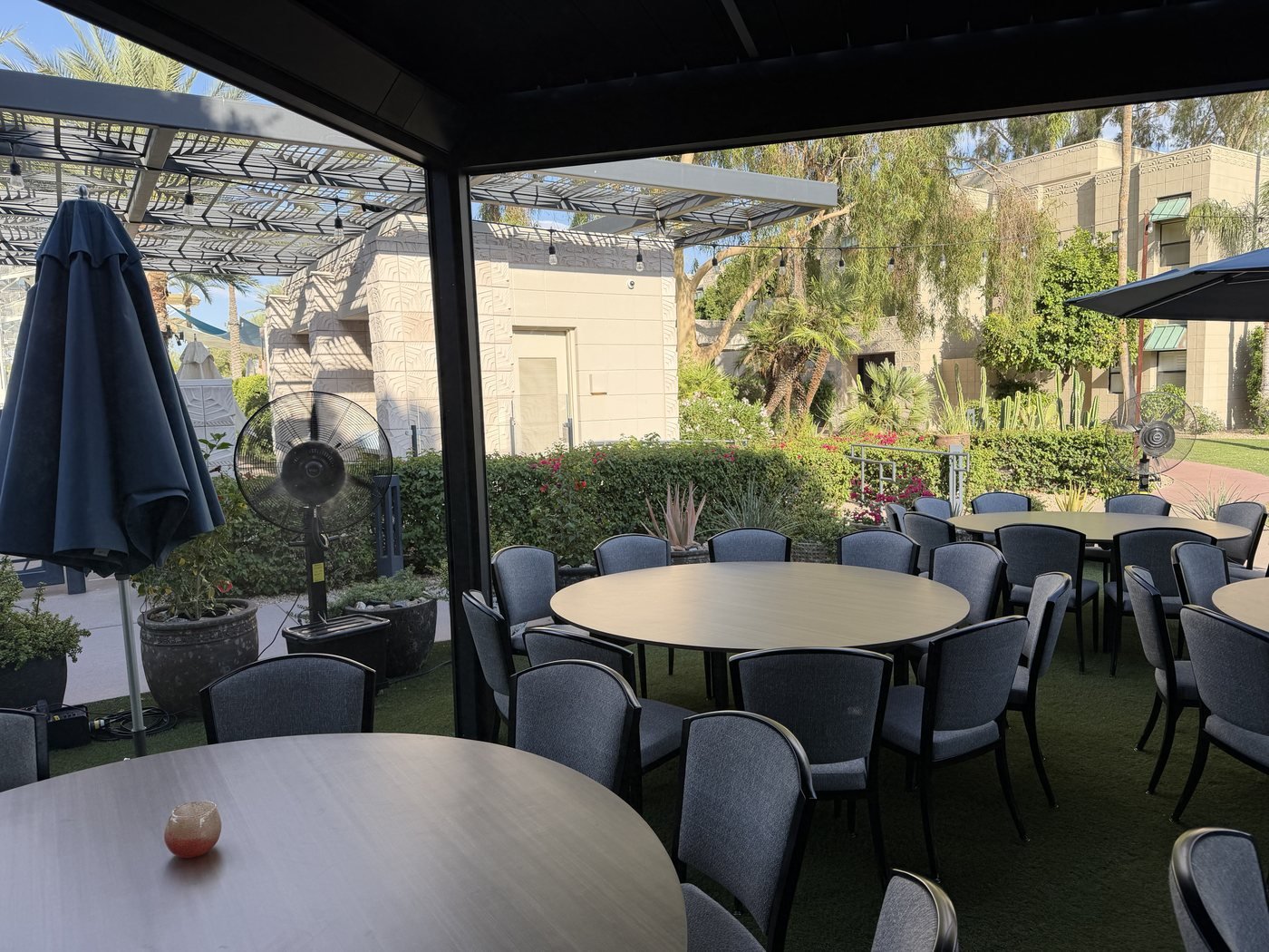 Patio dining with misting fan